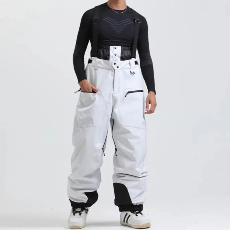 Pantalones de esquí con tirantes, unisex, para actividades al aire libre, resistentes al viento y a la nieve, cálidos, ideales para practicar snowboard, para hombres y mujeres, para esquí y deportes de invierno.