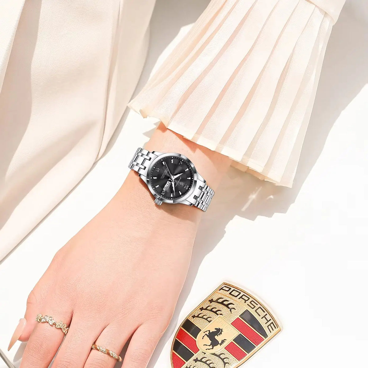 POEDAGAR Reloj de cuarzo de lujo para mujer, luminoso, de acero inoxidable, resistente al agua, con fecha y día, reloj de moda para mujer