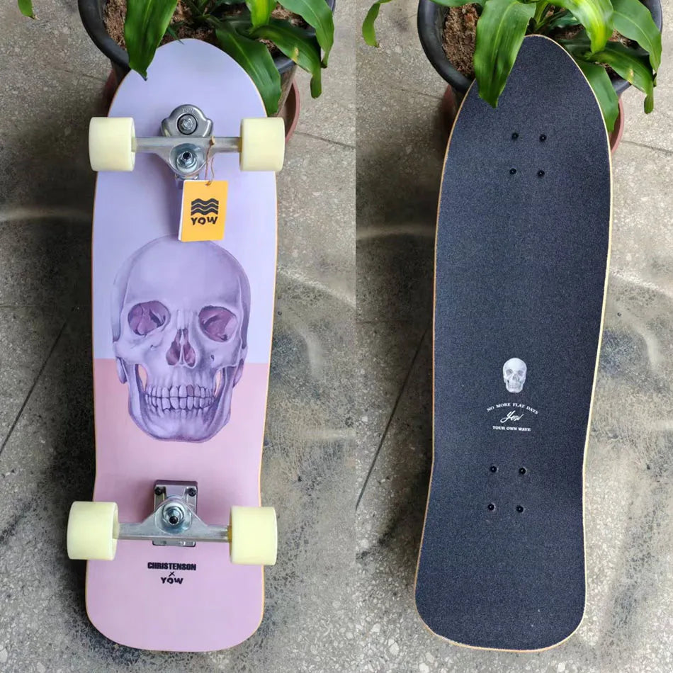 Patineta de surf YOW Land, modelo CHRISTENSON, diseño de calavera naranja, 34 pulgadas, con laterales curvos dobles, calidad profesional.