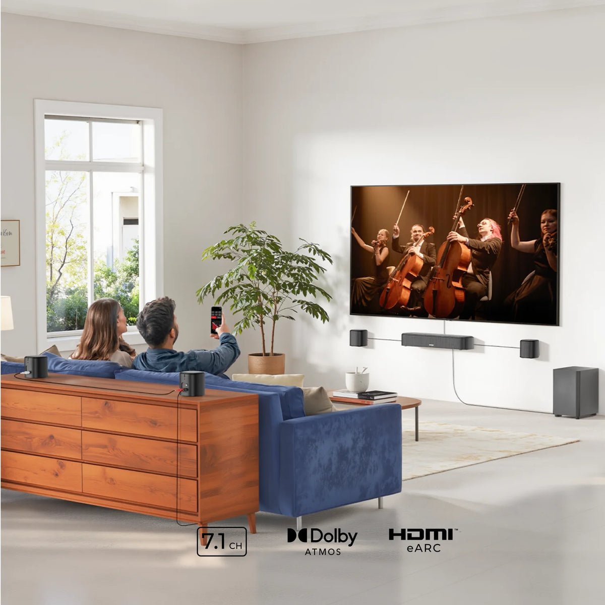 Barra de sonido negra y altavoces cilíndricos para TV en sala de estar