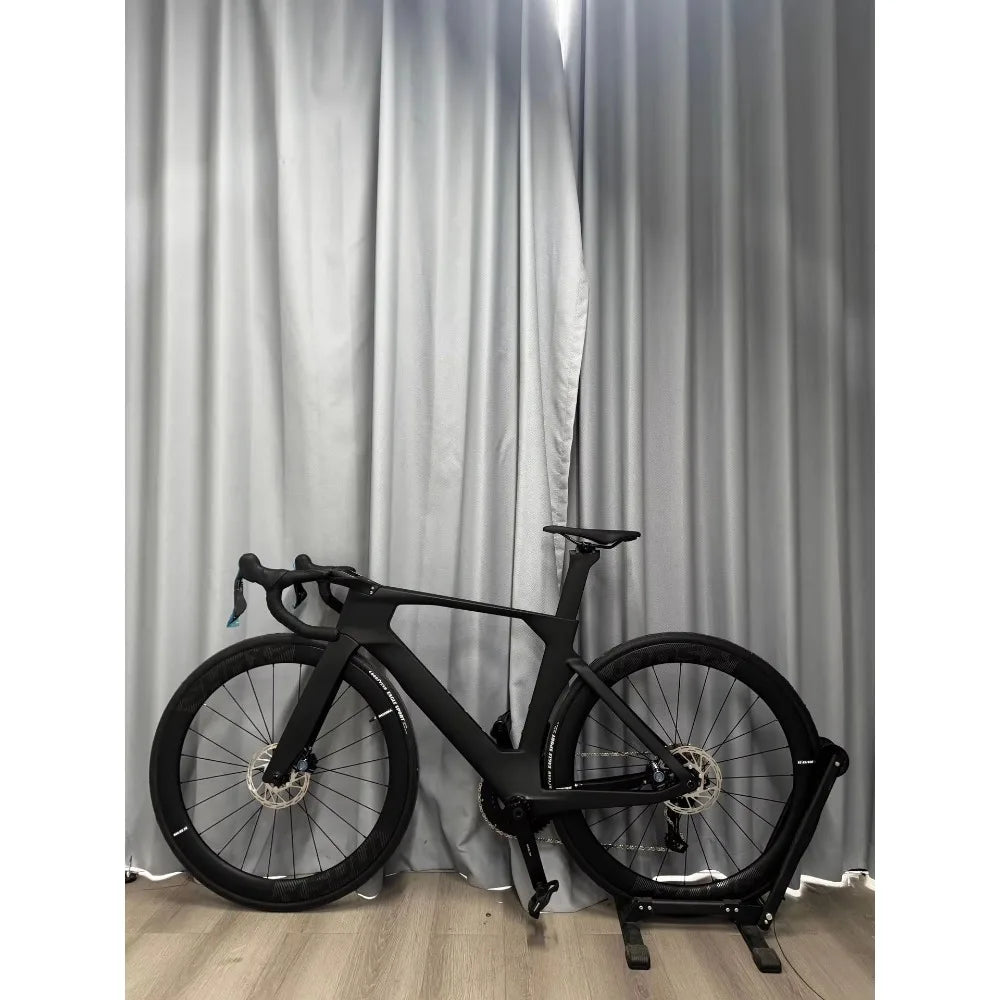 Bicicleta de carretera TT Racing de fibra de carbono, eléctrica, con cambios variables, frenos de doble disco y cuadro rígido