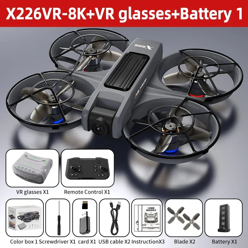 Dron RC gris de 4 hélices con control y kit con gafas VR y accesorios
